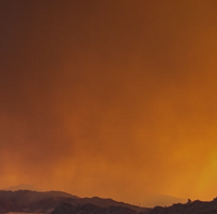 Distant fire and smoke