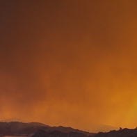 Distant fire and smoke